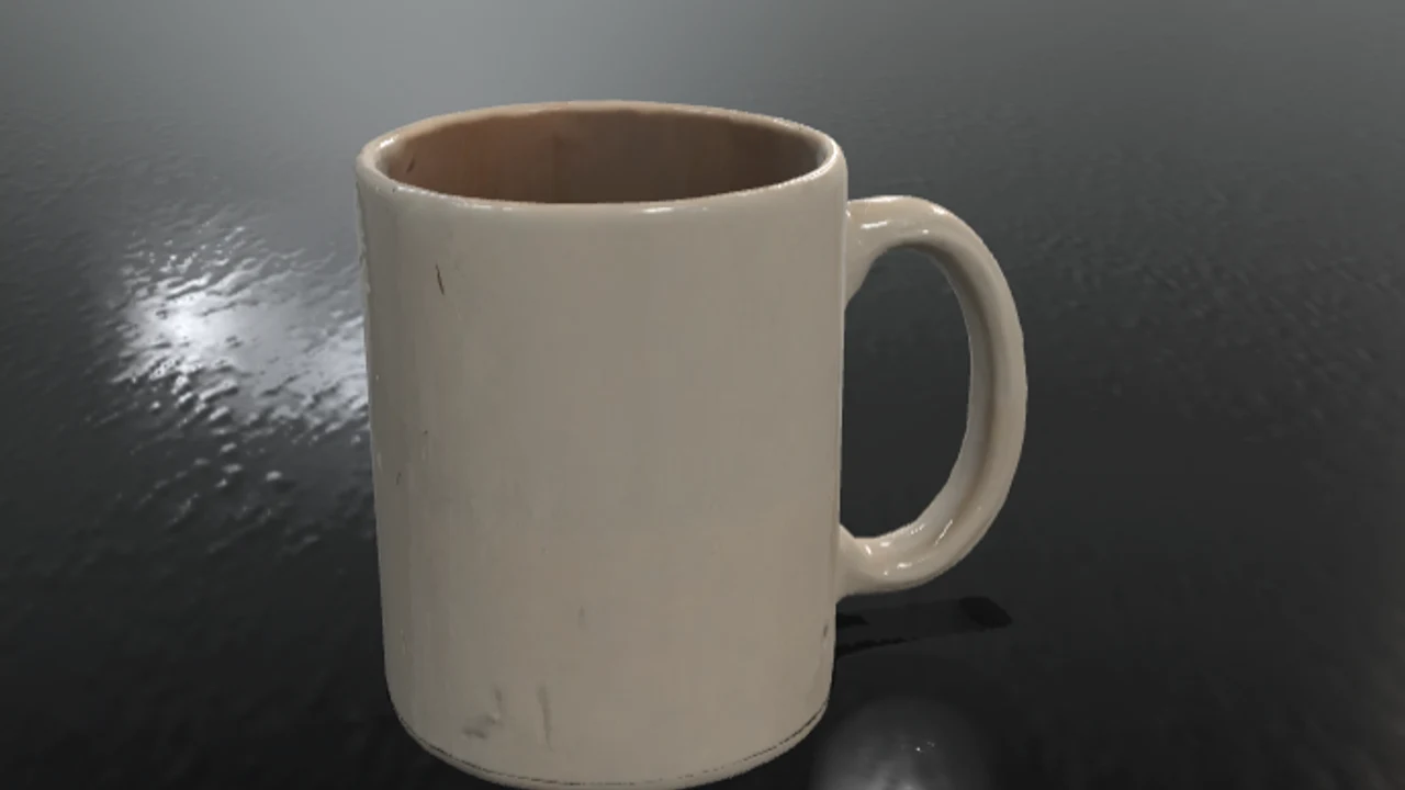 Otočitelný 3D model hrnku vygenerovaný z fotek, na tmavém pódiu
